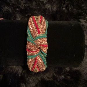Knotted gold,red,and green headband